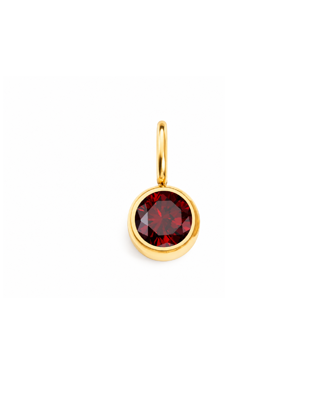 A gold pendant charm featuring a round, faceted deep red gemstone in a bezel setting, shown against a plain white background. January birthstone